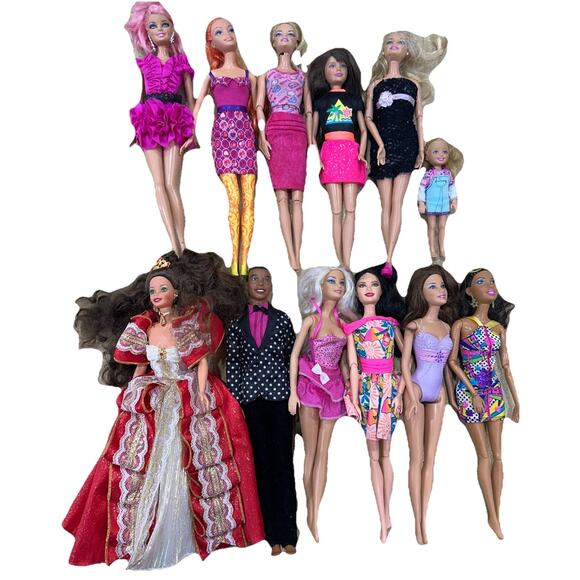 12 Barbies With Different Outfits please see photos. {103} - Picture 1 of 16